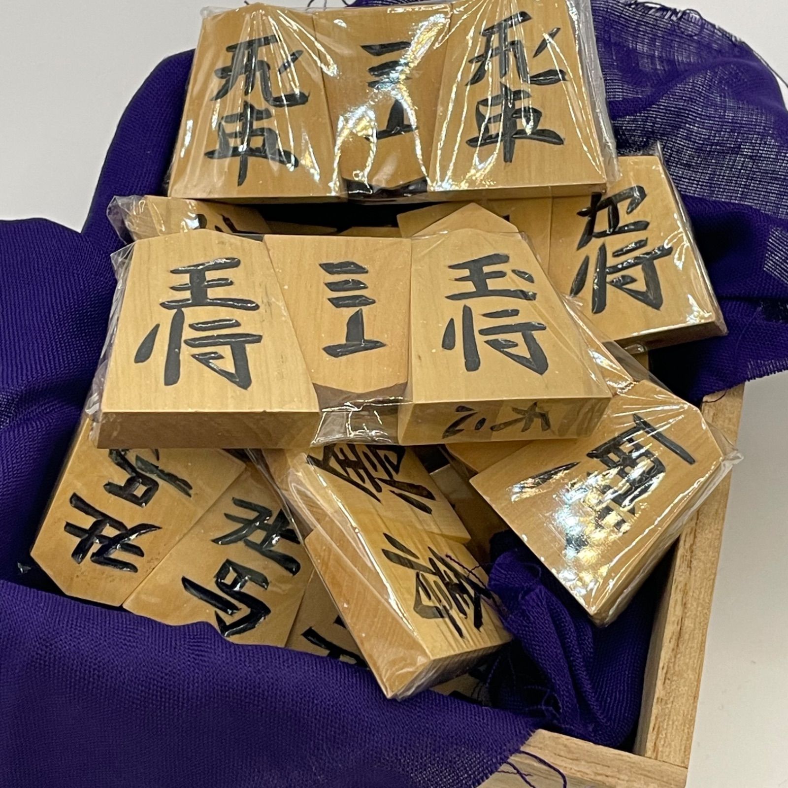 未使用パッケージ 将棋駒 天周堂 四代目 シャム黄楊 黒彫 天心銘 余り 