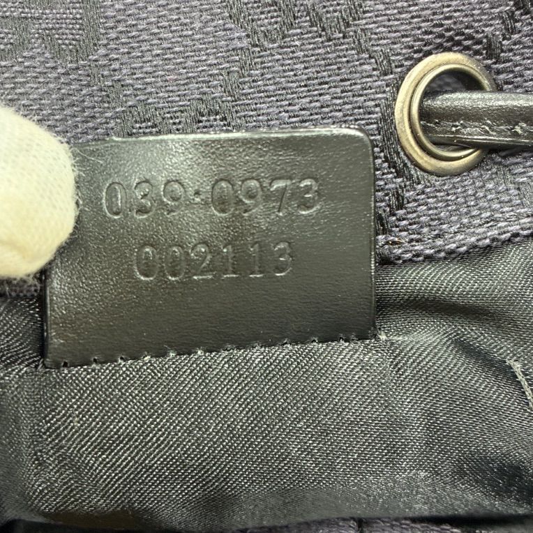 グッチGUCCI】GGキャンバス巾着ポーチ ハンドバッグ ブラック系 - メルカリ