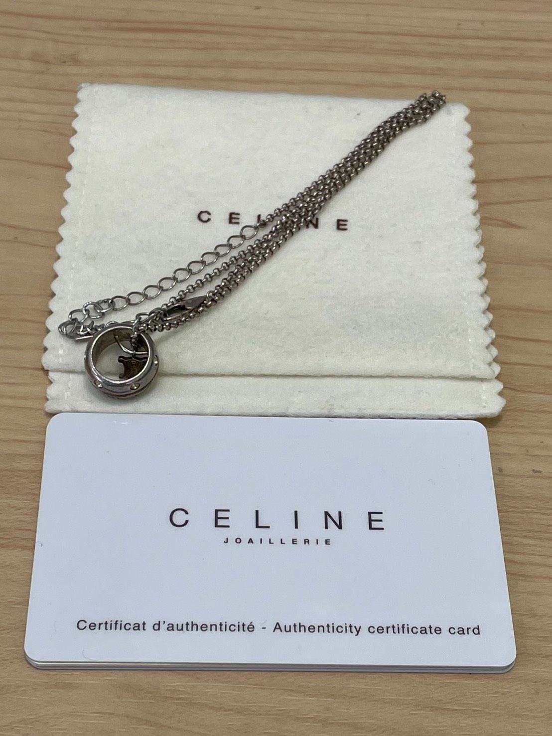 【豊】CELINE セリーヌ トリオンフ リング ネックレス ペンダント スウィングチャーム ロゴ ラインストーン装飾 SV925 銀 シルバー 【1398CK】F09