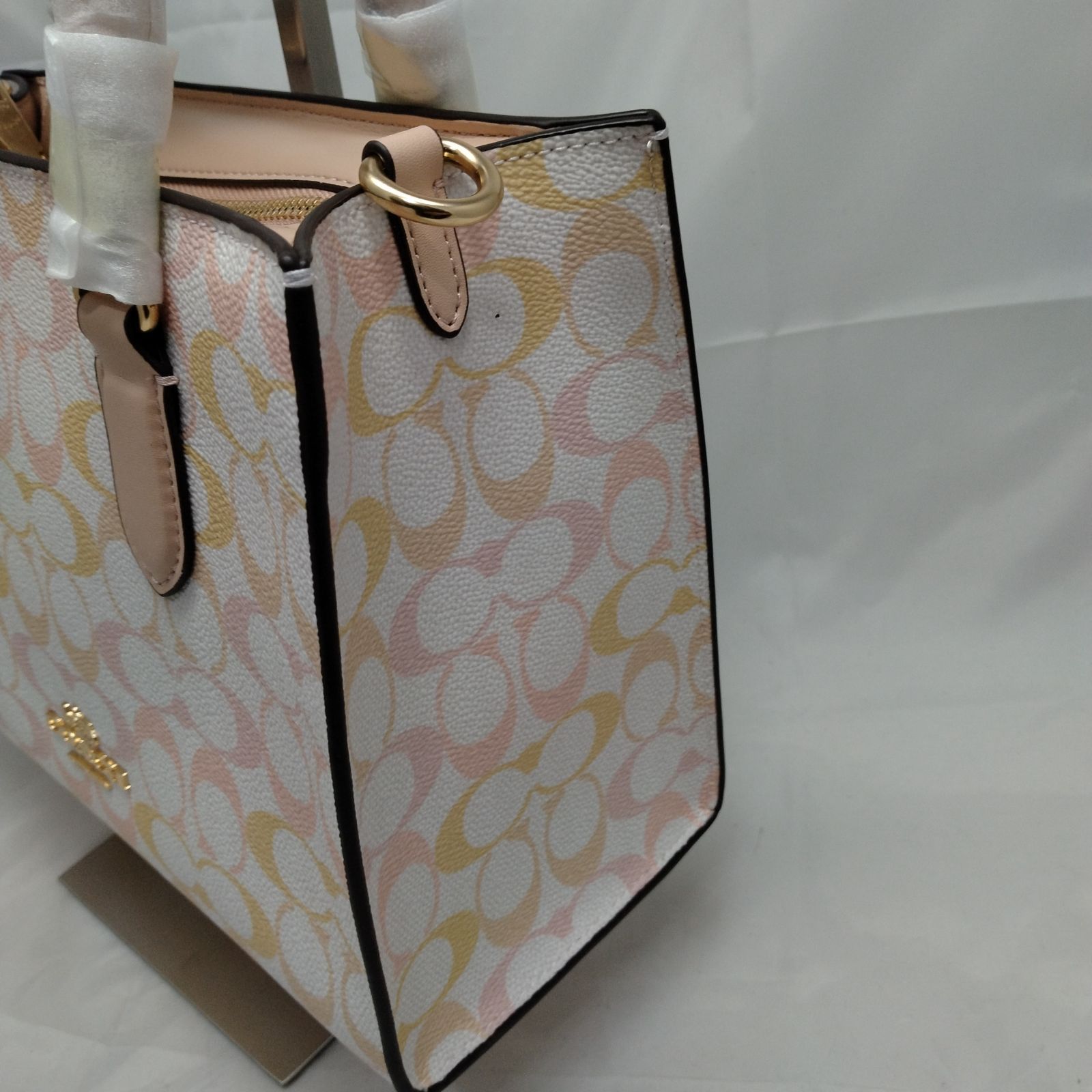新品未使用】COACH コーチ ハンドバッグ ピンク - メルカリ