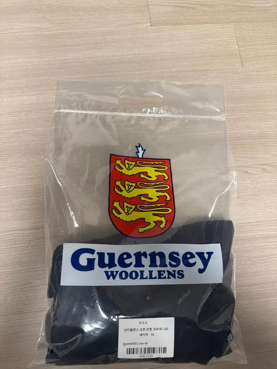 L Guernsey Woollens(ガンジーウーレンズ) コーン 半袖 クルーネック ニット ネイビー