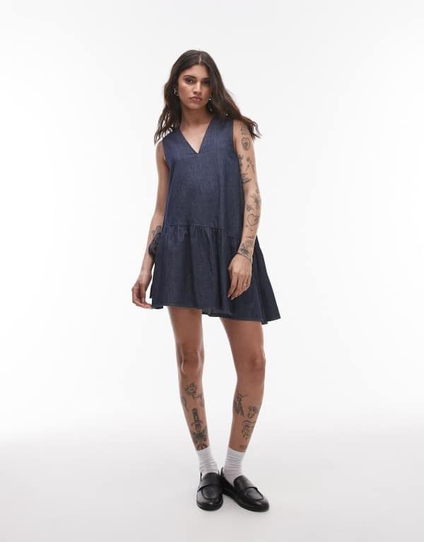 トップショップ レディース トップス ワンピース ミニワンピース ミニ デニム Topshop denim mini dress with peplum hem and bow detail in r