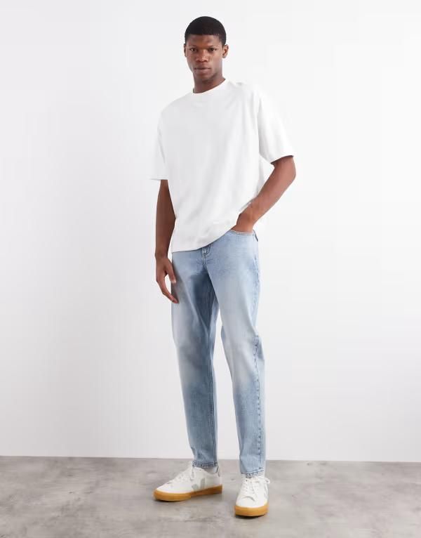 エイソス メンズ ボトムス デニムパンツ ジーンズ ASOS DESIGN stretch tapered jeans in lightblue wash LIGHT WASH BLUE ブルー