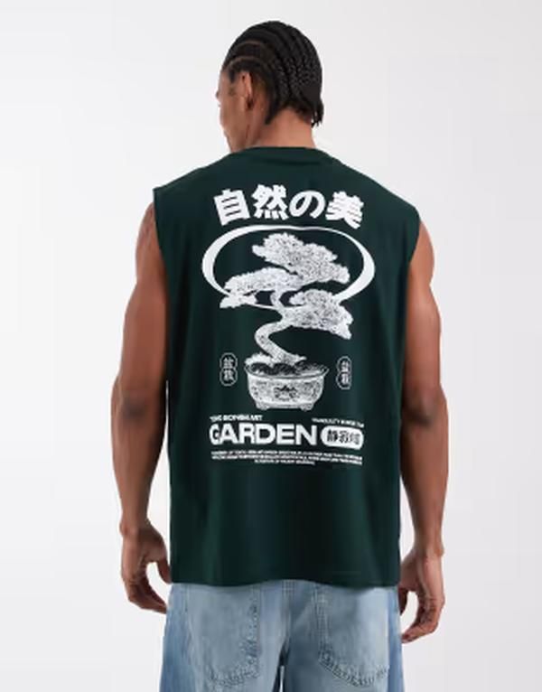 エイソス メンズ トップス ベスト グラフィック ASOS DESIGN oversized tank with bonsai graphic in dark Scarab グリーン