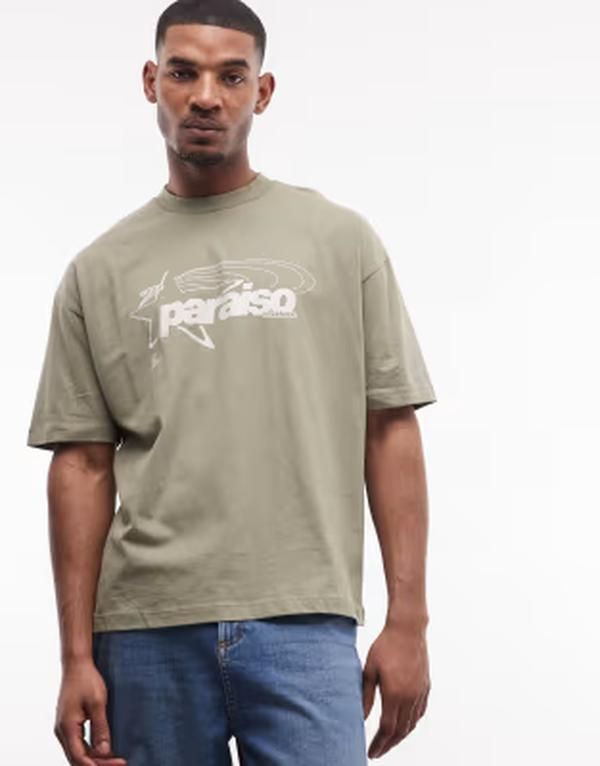 エイソス メンズ トップス Tシャツ グラフィック ASOS DESIGN boxy oversized tshirt with paraiso graphic Vetiver グリーン