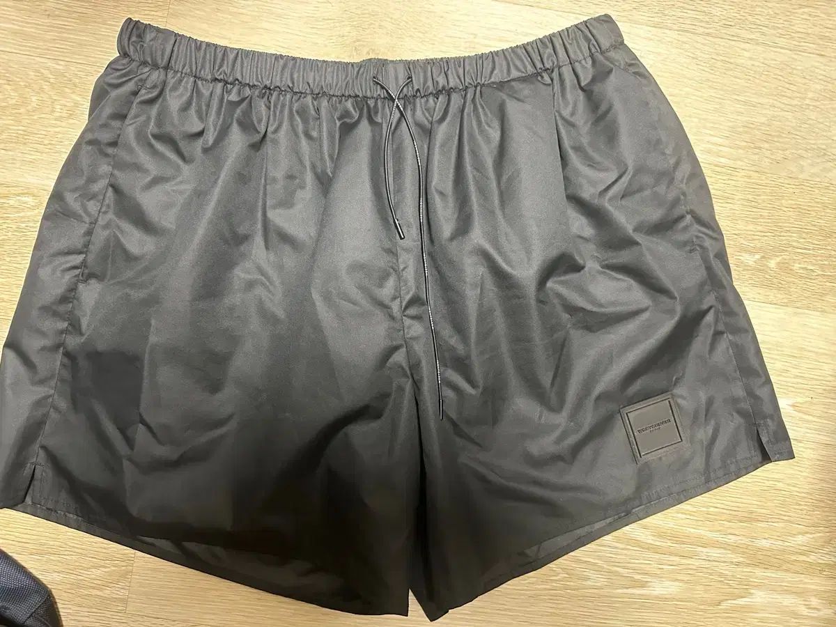 WOOYOUNGMI ウーヨンミ ナイロン パンツ 50 サイズ