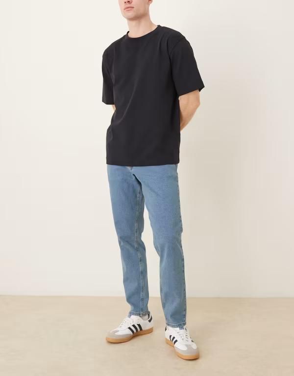 エイソス メンズ ボトムス デニムパンツ ジーンズ ASOS DESIGN stretch tapered jeans in mid wash Mid wash blue ブルー