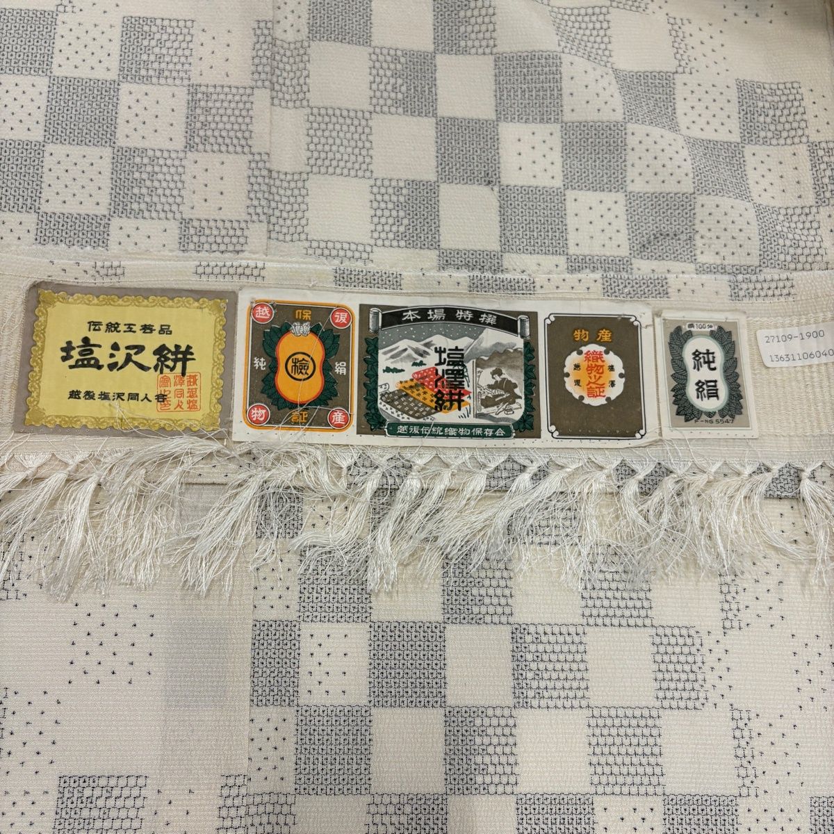 【美品】 塩沢紬 身丈165cm 裄丈64.5cm M 単衣 証紙 市松 亀甲絣 クリーム 正絹 逸品 【中古】