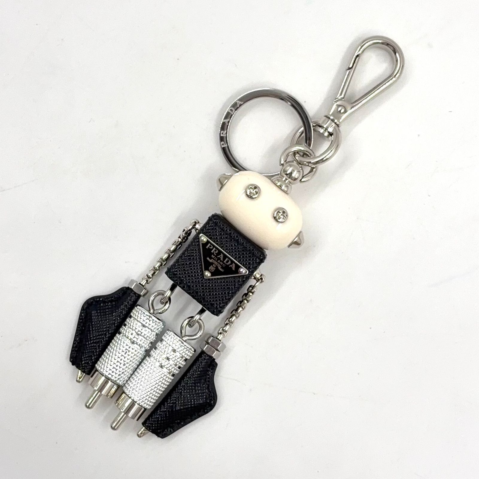 【新着】PRADA トリック ロボット キーチェーン レザー、プラスチック、メタル シルバー、ブラック、ホワイト チャーム