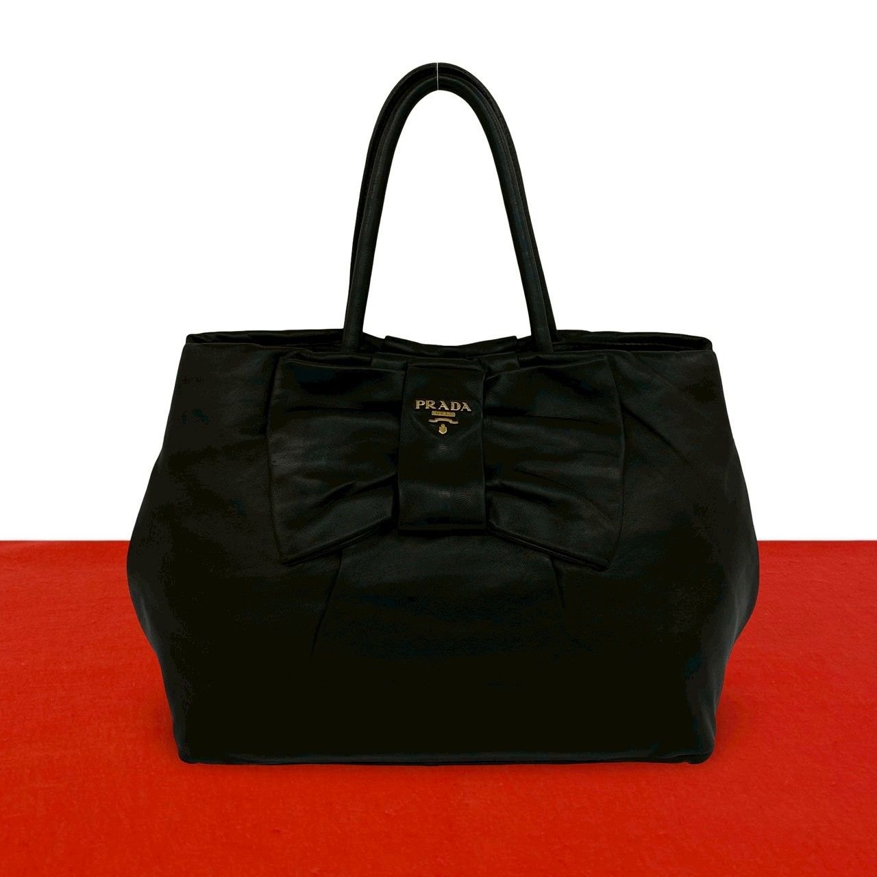 美品　PRADA　プラダ　ハンドバッグ　ボストンバッグ　金具　ロゴ　レザー　革 極 美品 PRADA プラダ ロゴ 金具 リボン モチーフ レザー 本革