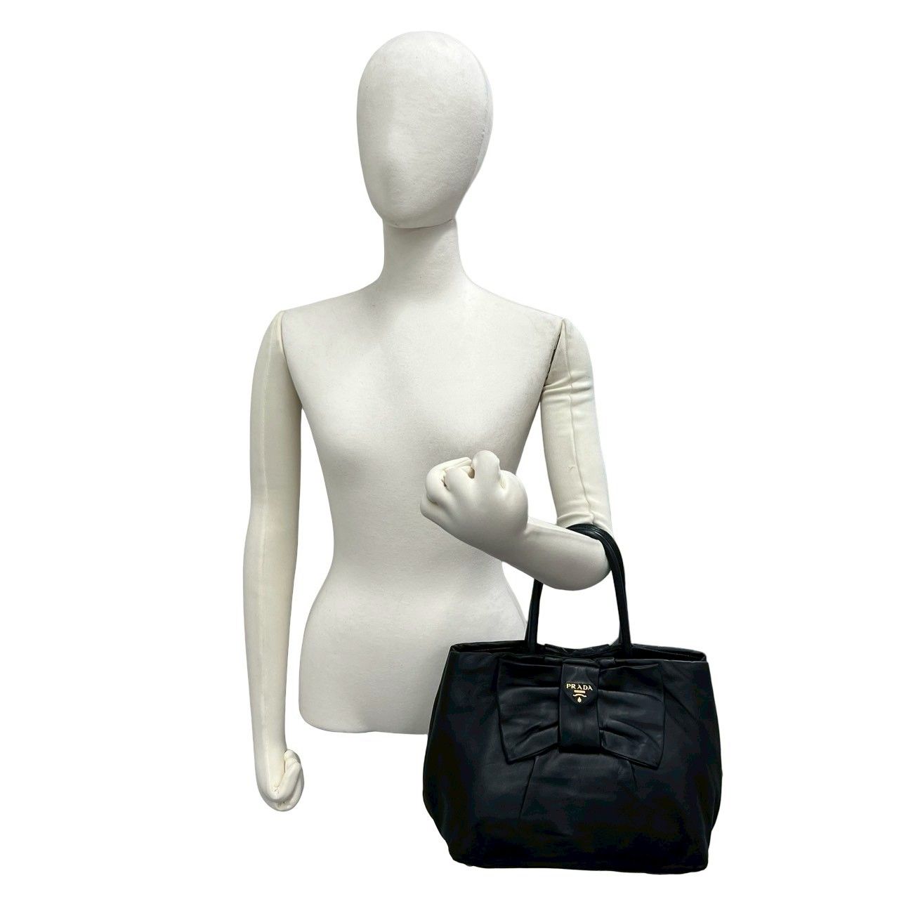 極 美品 PRADA プラダ ロゴ 金具 リボン モチーフ レザー 本革