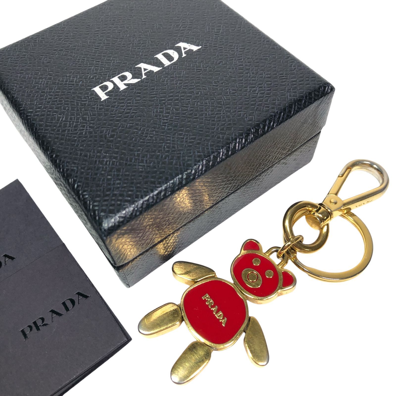 【プラダ】本物 PRADA キーリング 熊モチーフ キーホルダー チャーム ゴールド色系×赤色系 金属素材 メンズ レディース ケース付き