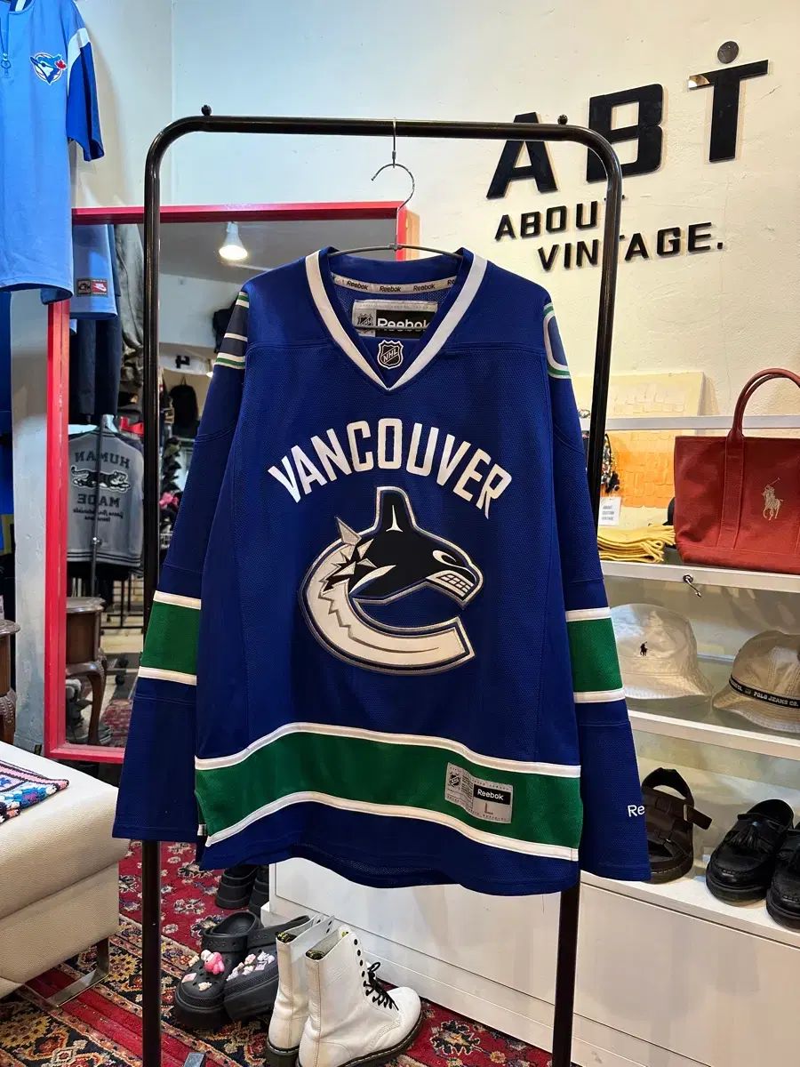 リーボック NHL バンクーバー・カナックス アイスホッケー ホーム ジャージ L