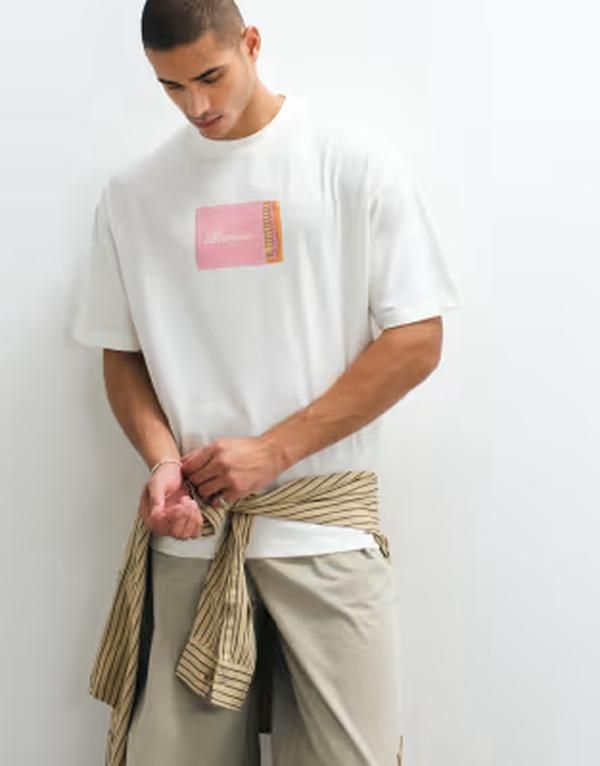 エイソス メンズ トップス Tシャツ グラフィック ASOS DESIGN oversized tshirt with matchbox graphic in cream Coconut milk ク