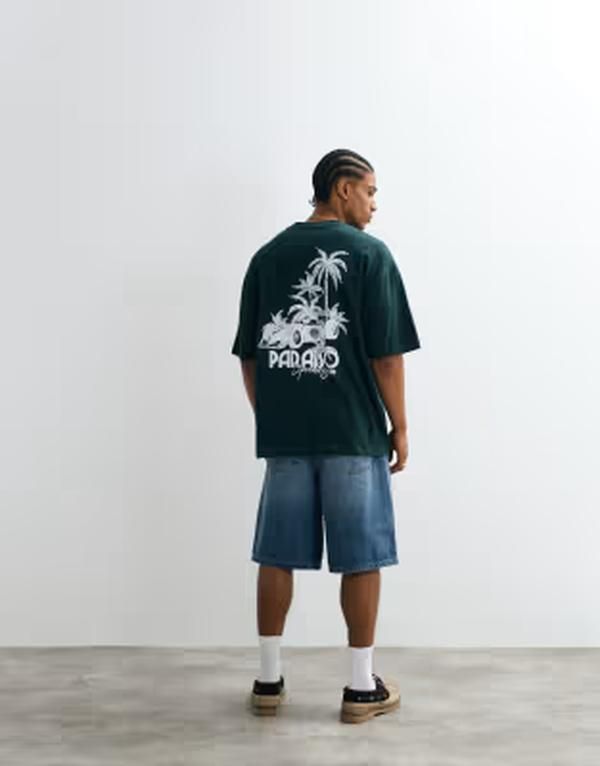 エイソス メンズ トップス Tシャツ グラフィック ASOS DESIGN oversized Tshirt with race car graphic in dark Scarab グリーン