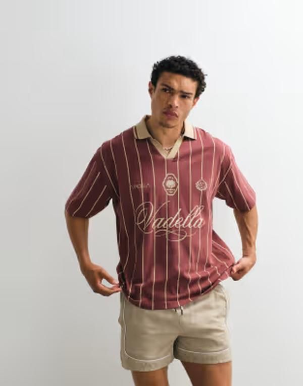 エイソス メンズ トップス ポロシャツ グラフィック ASOS DESIGN oversized polo shirt with soccer graphicstripesable バーガンディ 12,905円