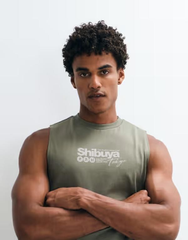 エイソス メンズ トップス ベスト グラフィック ASOS DESIGN regular tank with Shibuya graphic in olive Dusty olive オリーブ