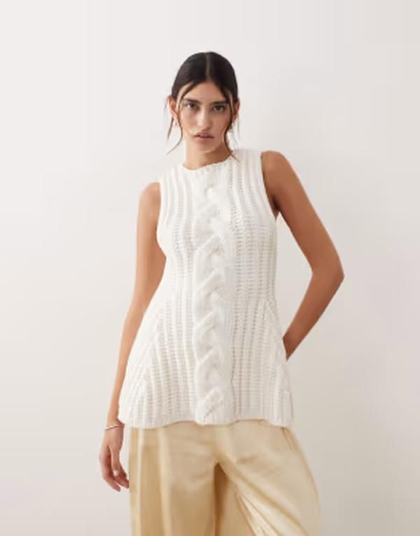 アレンジ レディース アウター ニット・セーター ARRANGE chunky cable knit peplum top IVORY アイボリー