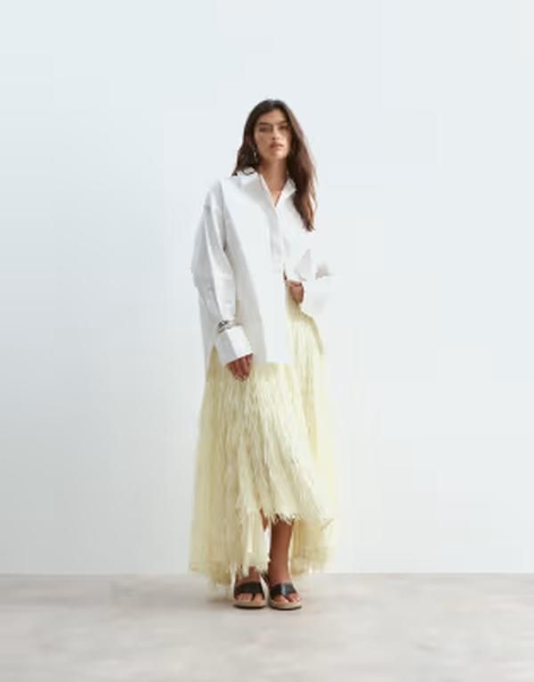 アレンジ レディース ボトムスカート アシンメトリー マキシ フリンジ ARRANGE fringe texture asymmetric maxi skirt in soft yellow Soft