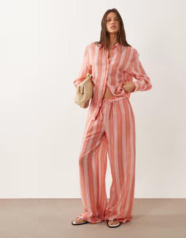 マンゴ レディース ボトムス カジュアルパンツ Mango Clay oversized pants in orange and pink stripes part of a set ORANGE オ