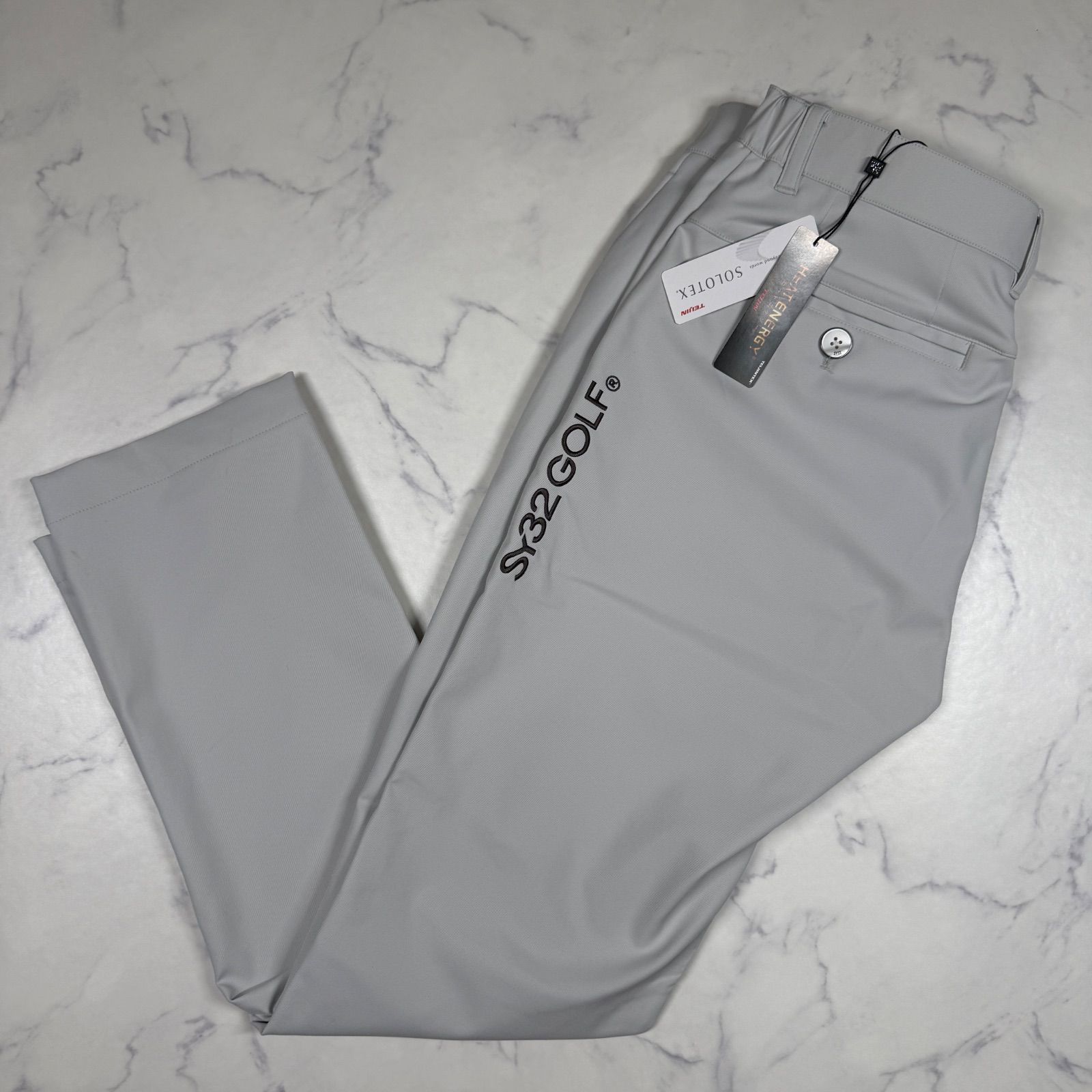 SY32 GOLF SOLTEX ストレッチ テーパードパンツ グレー XL 新品タグ付き