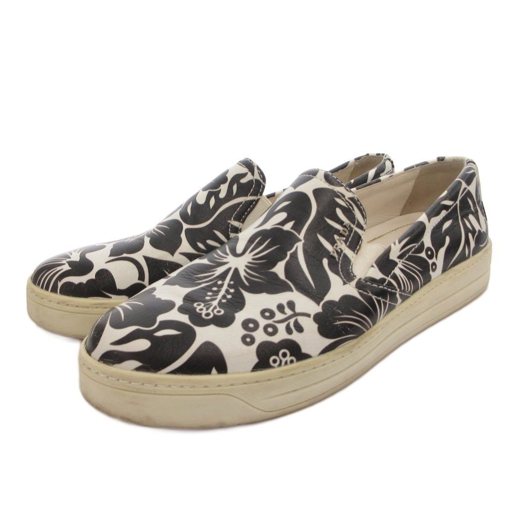 プラダ PRADA スリッポン スニーカー シューズ ロゴ 花柄 バイカラー 37.5 黒 ブラック 白 ホワイト /FF ■GY62