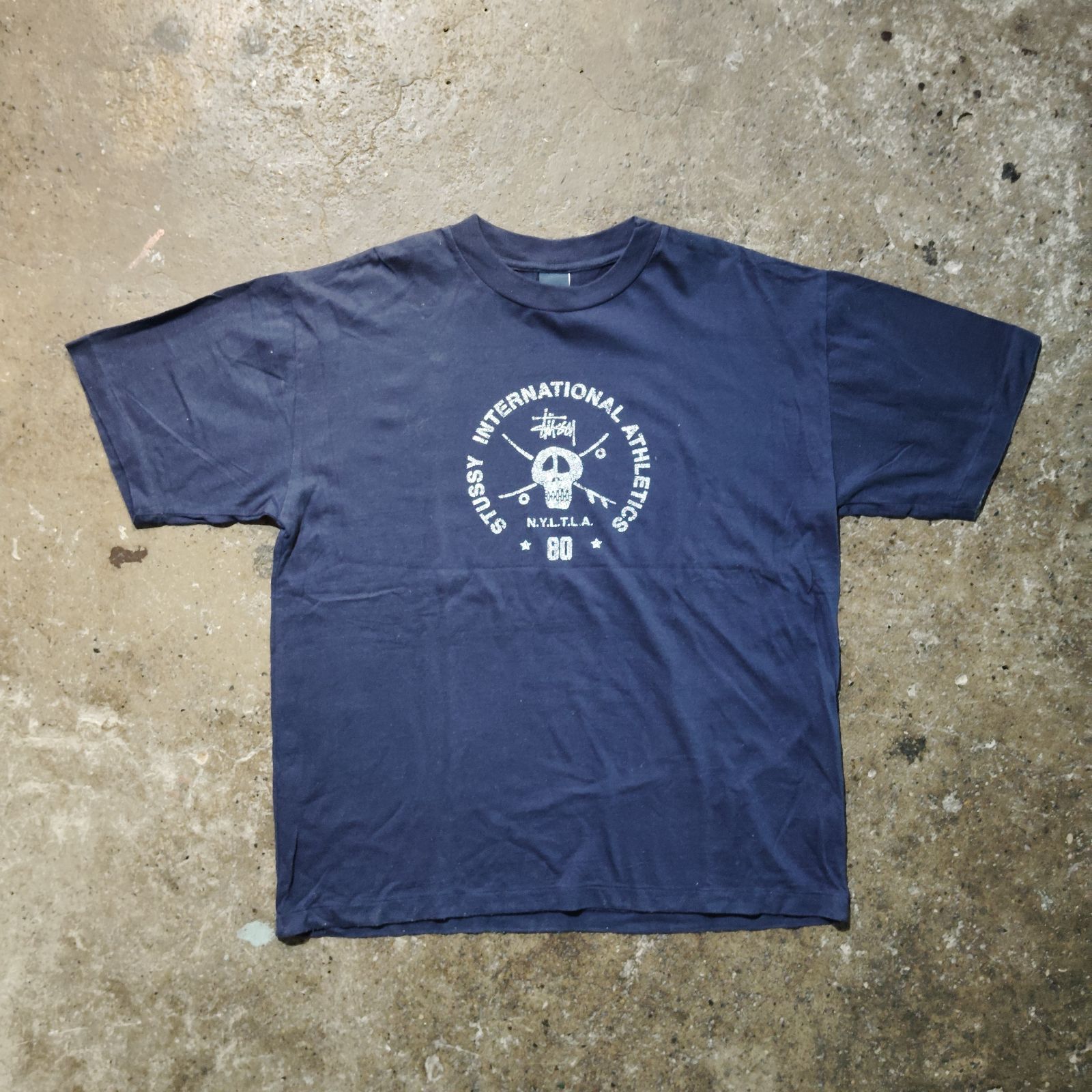 STUSSY 90s スカルプリントTシャツ INTERNATIONAL ATHLETICS