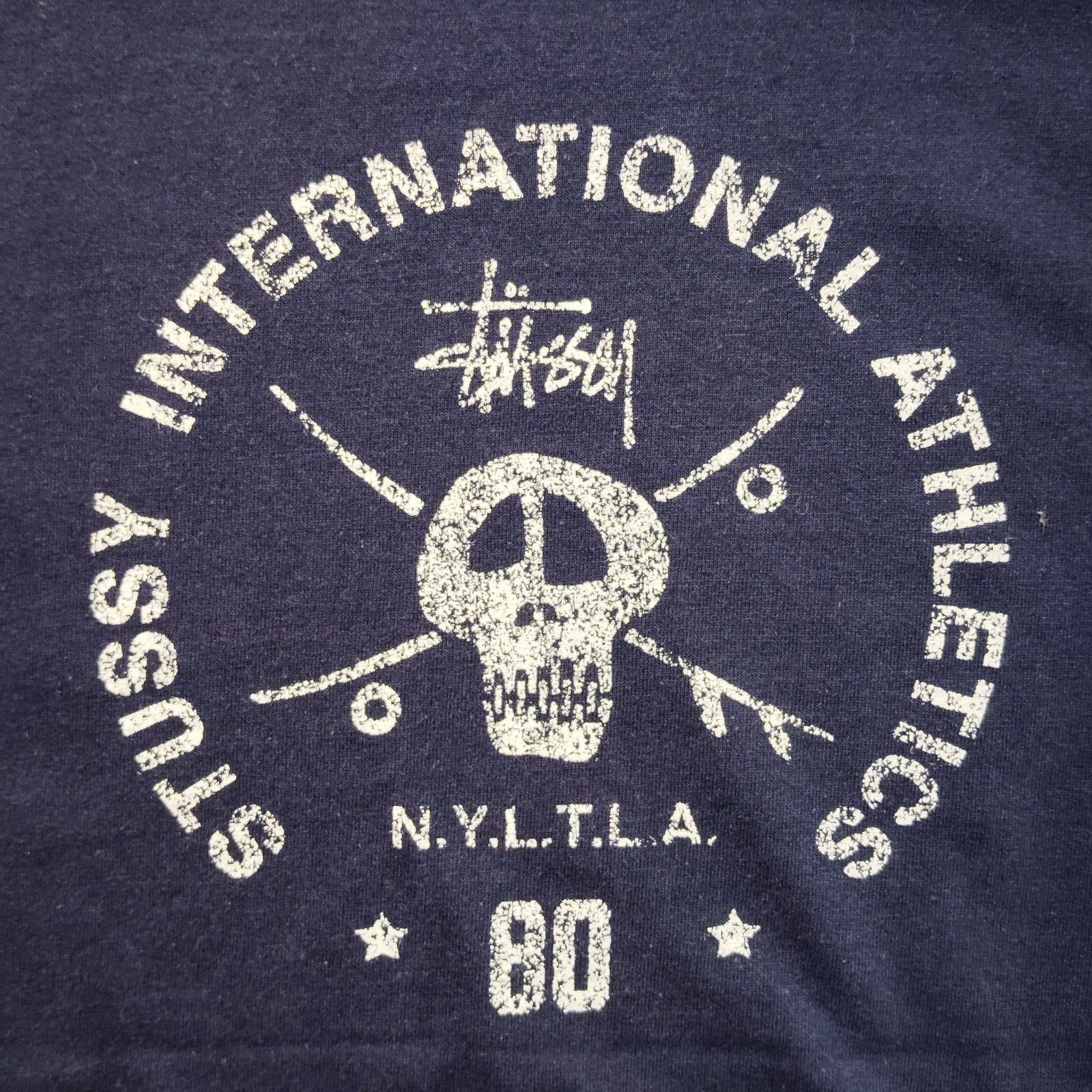STUSSY 90s スカルプリントTシャツ INTERNATIONAL ATHLETICS