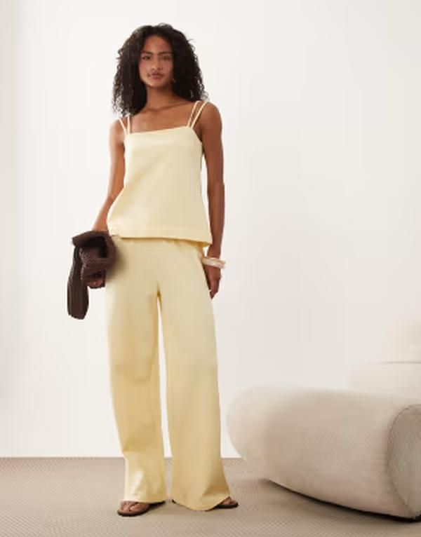 エイソス レディース ボトムス カジュアルパンツ ワイドレッグ ASOS DESIGN wide leg drawstring pants in buttermilk yellow part of a