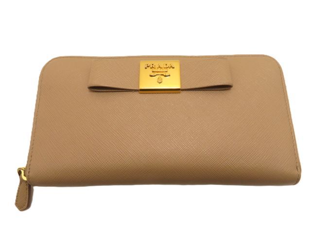 PRADA プラダ バッグ リボン ラウンドファスナー長財布 ベージュ サフィアーノ ｻｲﾌ･小物 1ML506 長財布 レディース【中古】