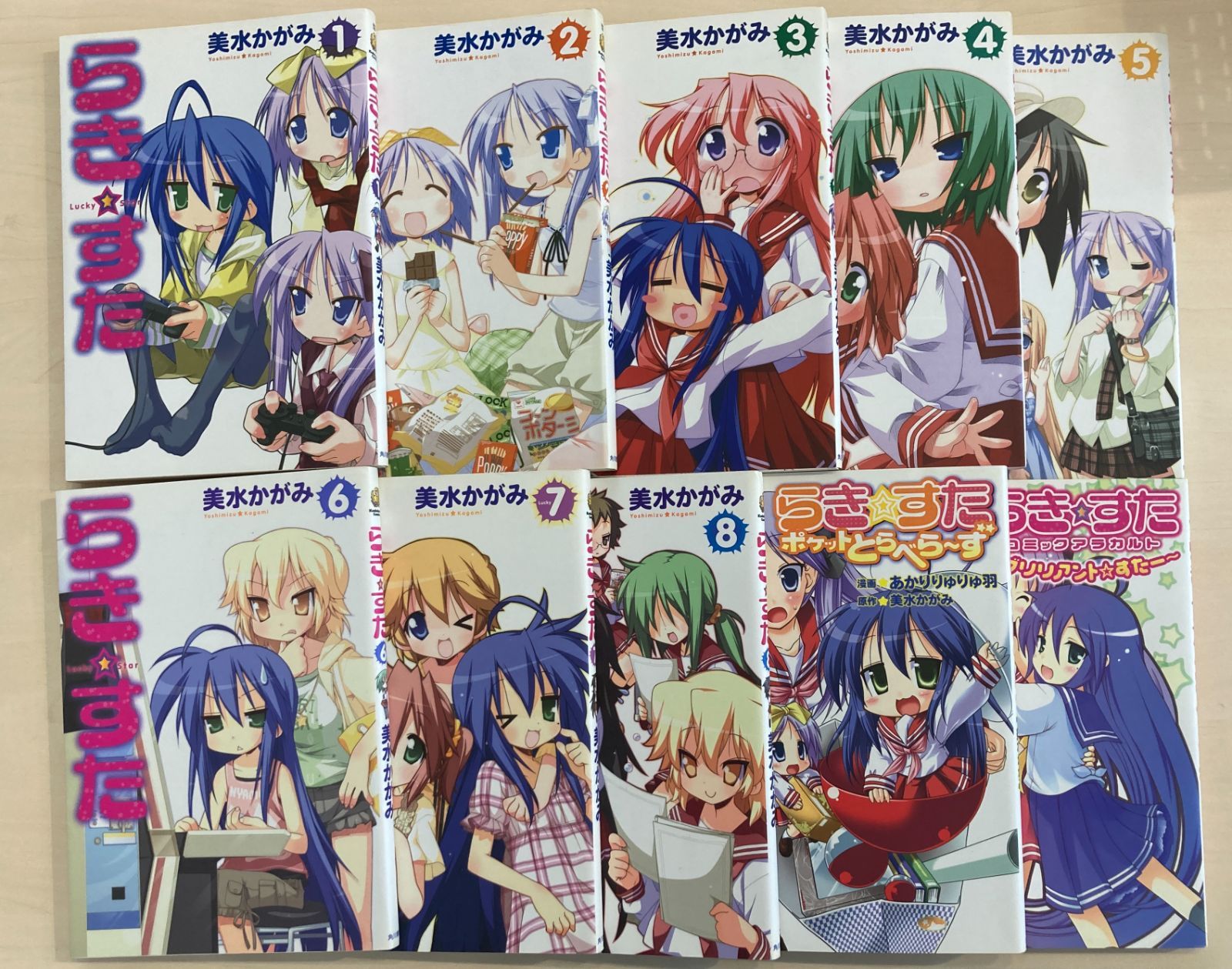 らき☆すた漫画11冊＆ガイドブック2冊＆CD11枚＆当時物チラシ＆特典物セット らき☆すた 1〜8巻 ＋ 関連本2冊 計10冊セット 美水かがみ 4コマ漫画