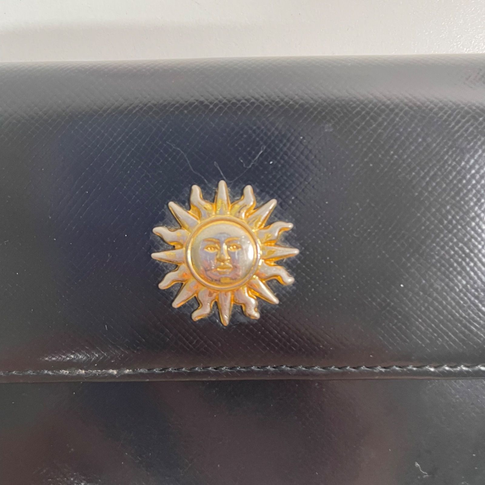 Gianni Versace 二つ折り財布 サンバースト - メルカリ