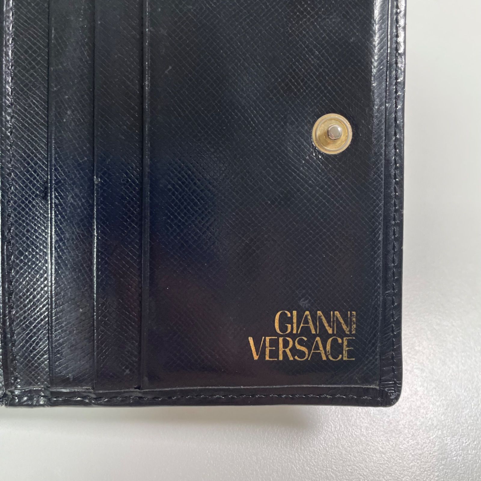 Gianni Versace 二つ折り財布 サンバースト - メルカリ
