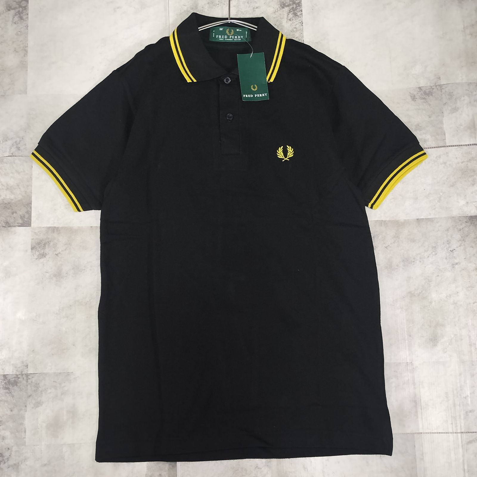 【未使用品】FRED PERRY M12 ポロシャツ サイズ36 ブラック/イエロー コットン 綿100% 英国製 ENGLAND ロゴ刺繍 ユニセックス 男女兼用
