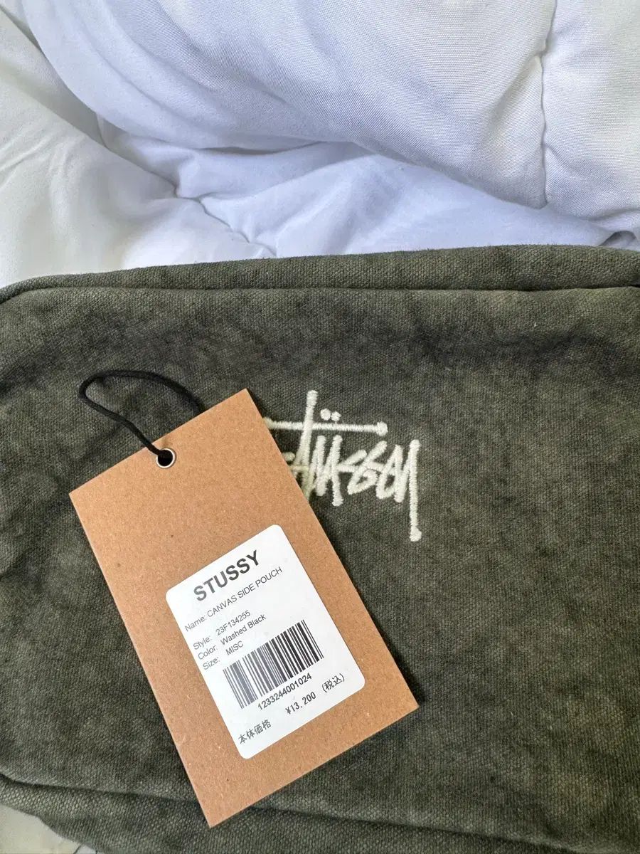 STUSSY キャンバス サイド ウォッシュドバッグ