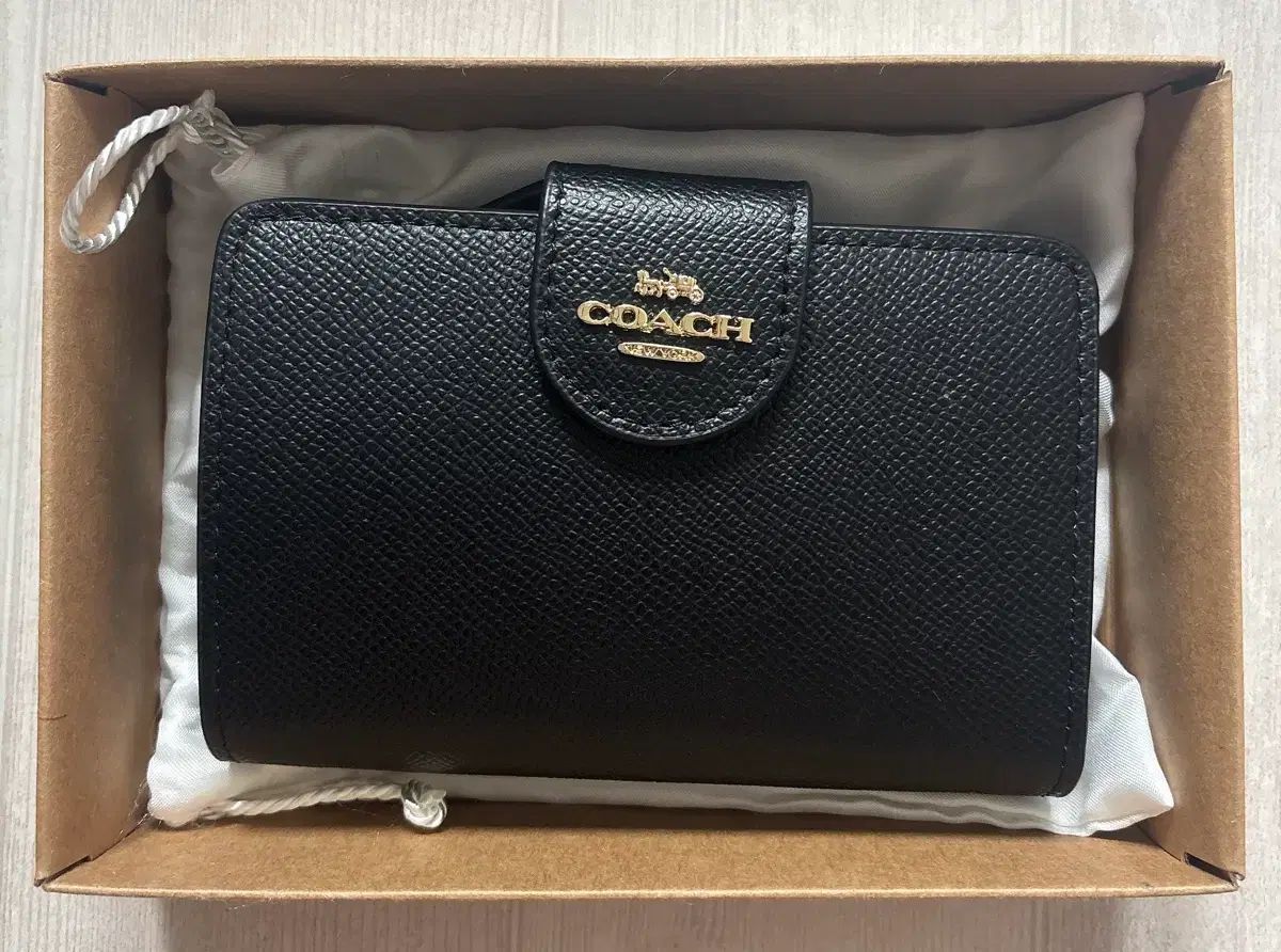 COACH レディース 二つ折り財布