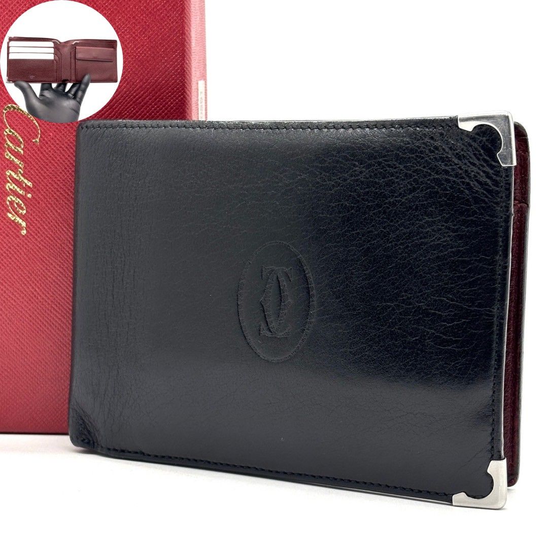 【静かに品を携える】　Cartier　マストドゥカルティエ 二つ折り財布 カーフスキン バイカラー　黒 バーガンディ