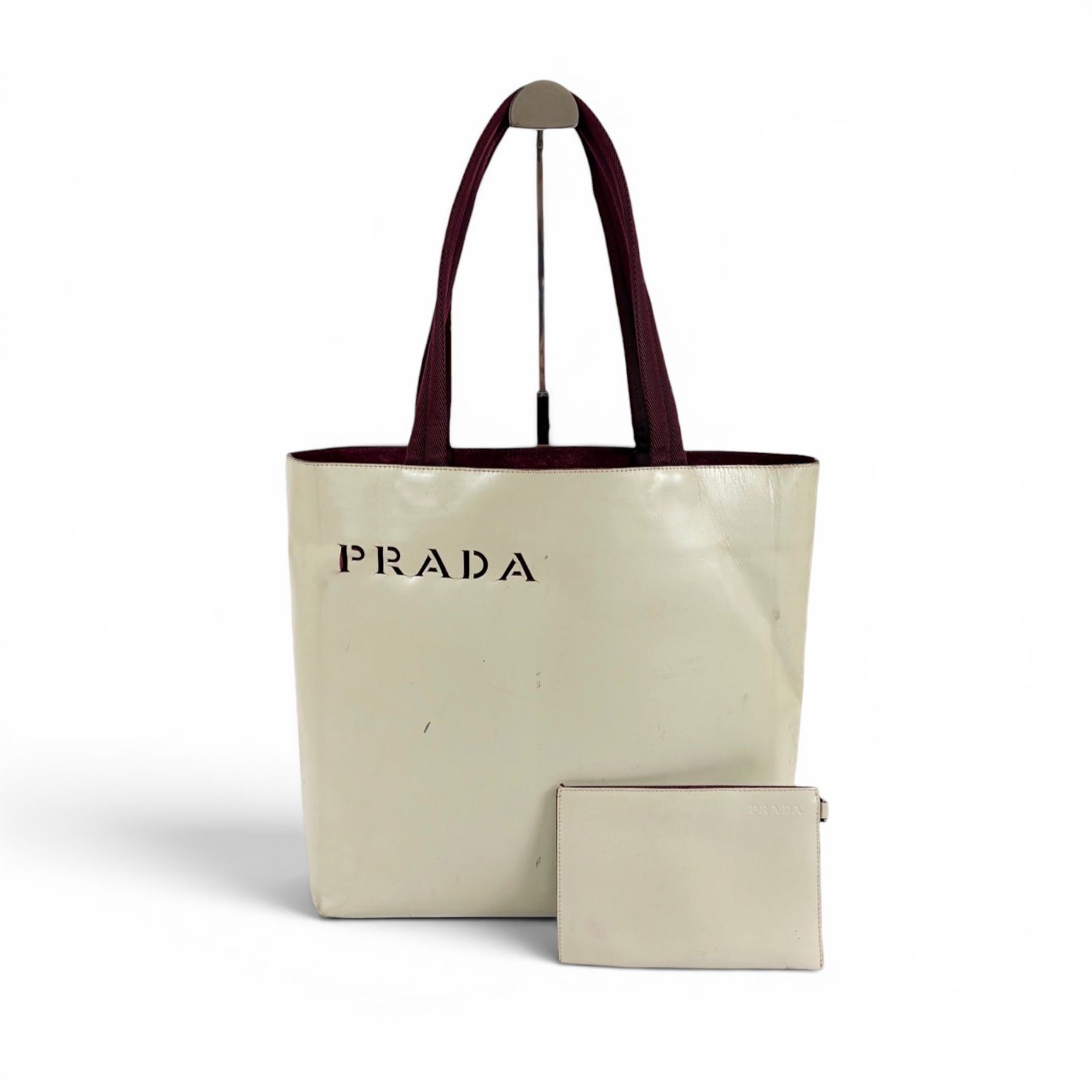 PRADA プラダ ハンドバッグ パンチングロゴ レディース アイボリー系 プラダ PRADA パンチングレザー ポーチ付き トートバッグ 肩掛け