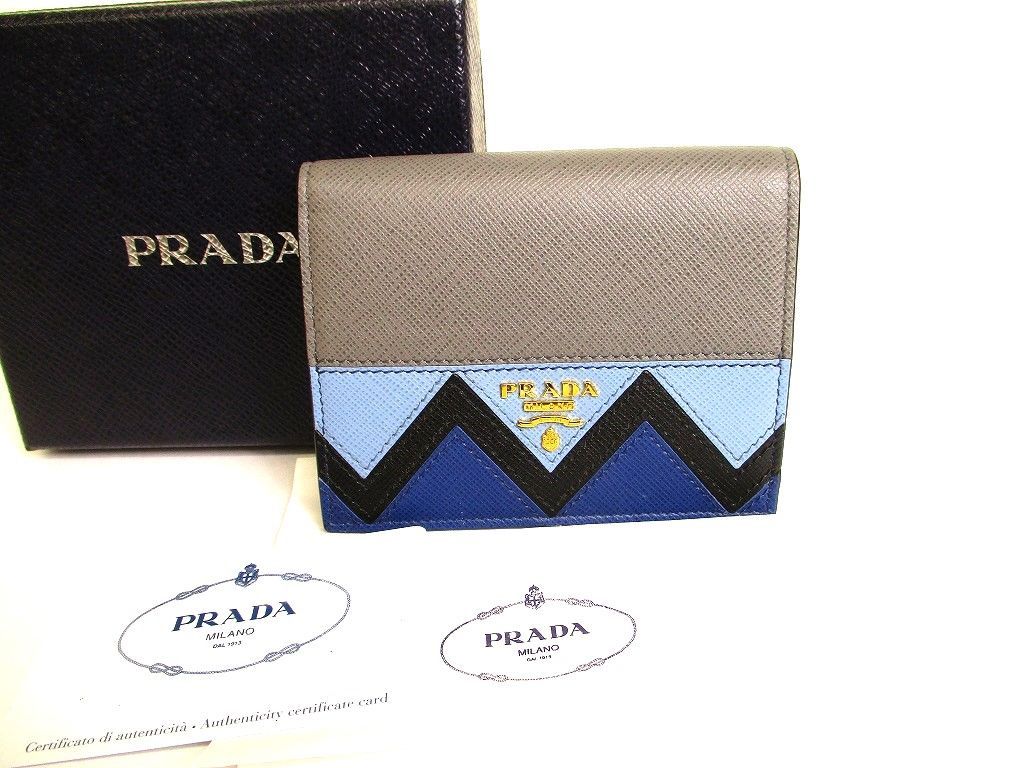 プラダ PRADA サフィアーノ レザー 2つ折り 財布 コンパクト財布 コンパクトウォレット メンズ レディース 【未使用保管品】