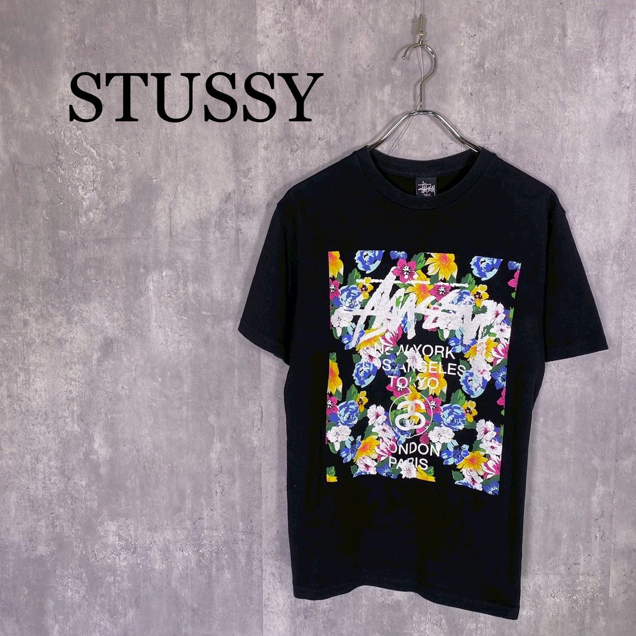 『STUSSY』ステューシー (S) フラワーグラフィックプリントTシャツ メンズ