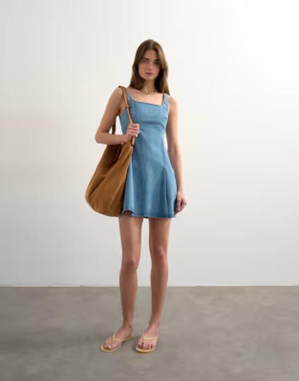 トップショップ レディース トップス ワンピース ミニ デニム Topshop denim flippy seamed pleats hemini dress in bleach デニム