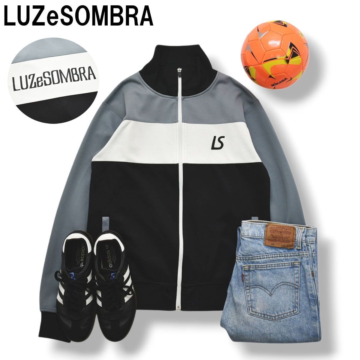 ルースイソンブラ LUZeSOMBRA トラック ジャケット ジャージ ジップアップ スタンドカラー ロゴ プリント 刺繍 L グレー x ブラック サッカー フットサル スポーツ メンズ