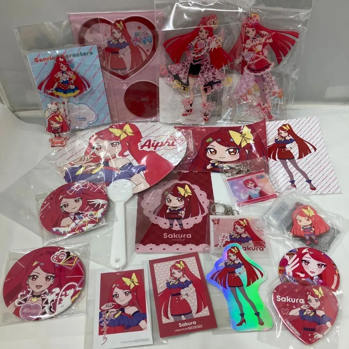 ひみつのアイプリ 一条寺サクラ グッズ 約１９点 アクリルスタンド、アクリルキーホルダー、缶バッジ他 まとめて サンリオコラボ キティー