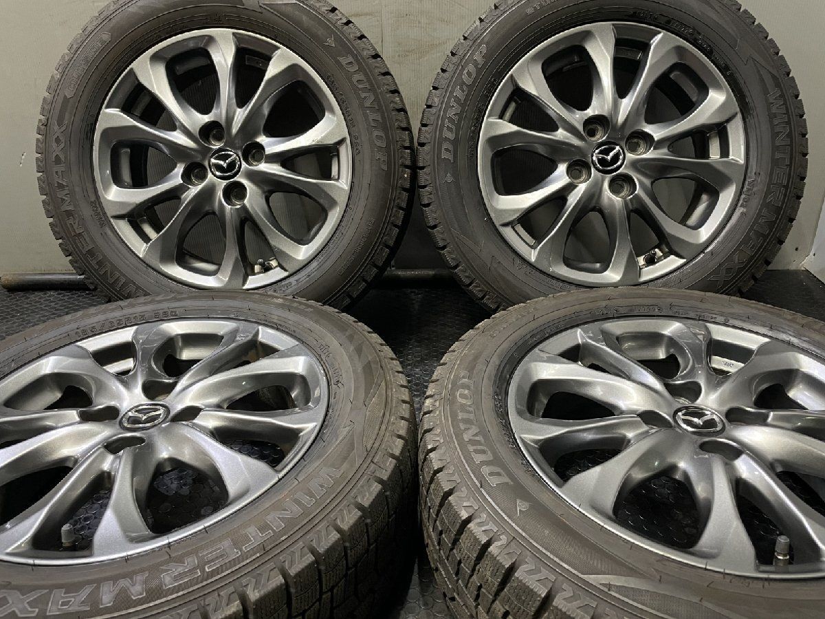 【DUNLOP WM02 185/65R15】スタッドレス【MAZDA デミオ 純正ホイール 15インチ 5.5J4HPCD100+40】22年製 バリ溝 ハイグロス　(VTP535-2)