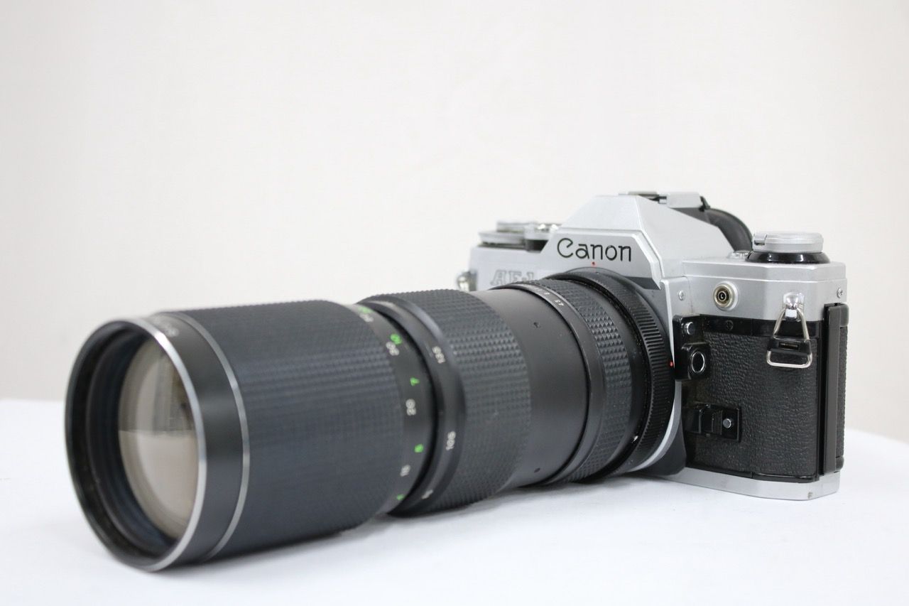 【返品保証】 キャノン Canon AE-1 SUN AUTO ZOOM 85-210mm F4.5 ボディレンズセット e13791