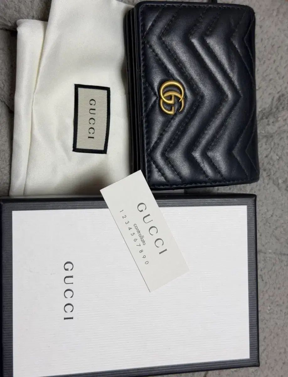 グッチ GG マーモント マトラッセ 財布
