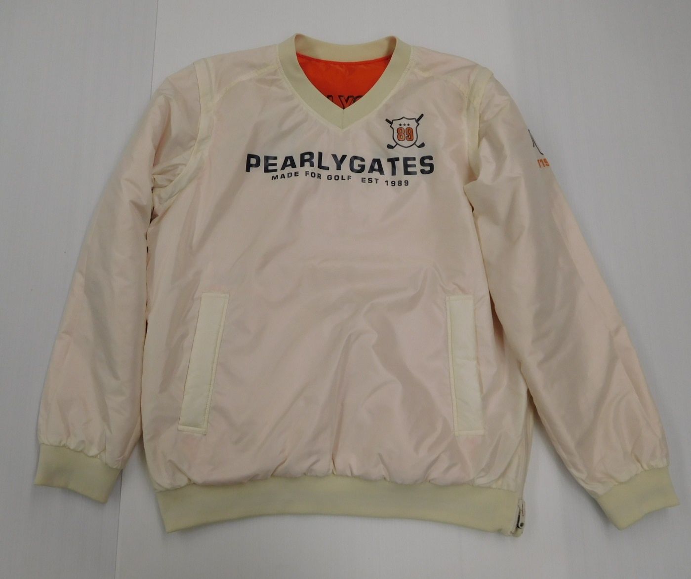 PERLY GATES パーリーゲイツ メンズゴルフウェア 中綿リバーシブルスニード ホワイト×オレンジ 袖着脱可 size:6 中古囗T巛