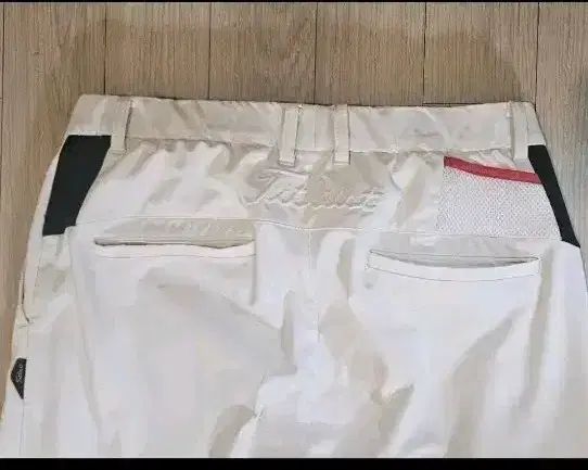 タイトリスト ゴルフパンツ 白 34 総丈105