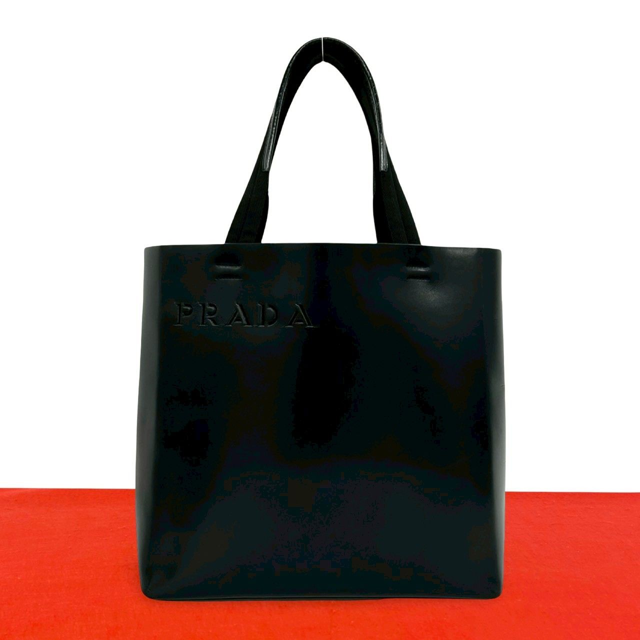 極 美品 希少品 PRADA プラダ パンチング ロゴ 型抜き レザー 本革 トートバッグ ミニ ハンドバッグ ブラック 黒 レディース 958-6