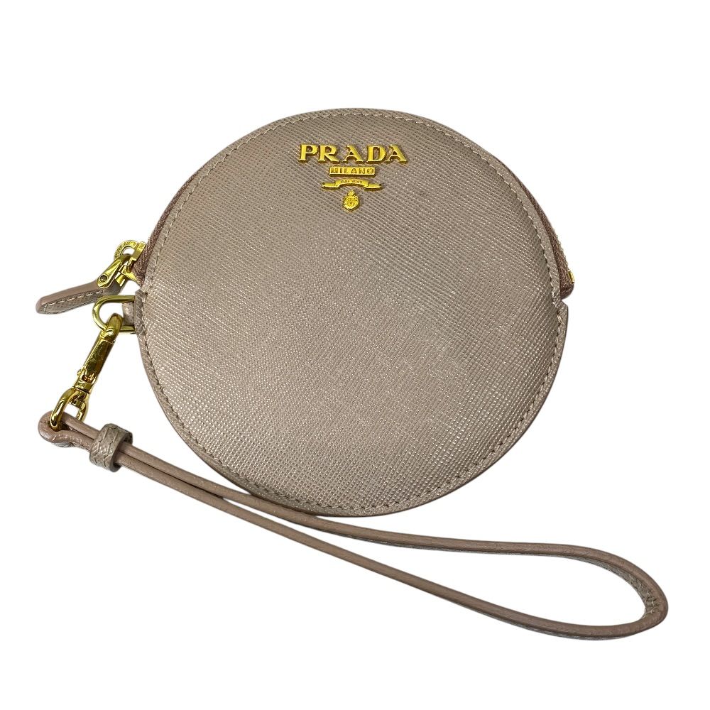 PRADA プラダ コインケース コインウォレット 小銭入れ ポーチ サークル サフィアーノ レザー ベージュ ゴールド 普段使い 通勤 通学 お出かけ 定番 人気 上品 洗練 実用的 機能的 収納力 デイリー 16,500円